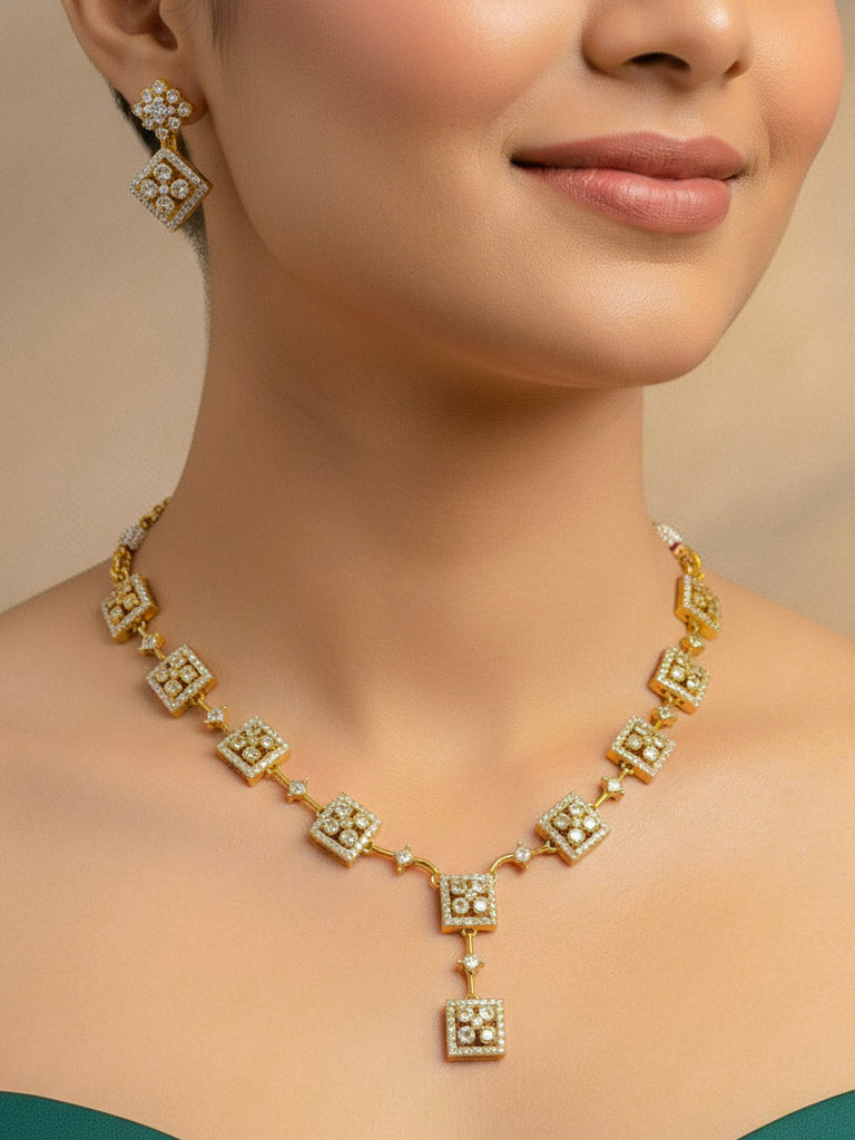 Close-up of a woman wearing an ornate Indo-western (gold Polish) Collar Diamond jewellery set and earrings with American Diamond. Festive Diwali outfit styled with an American diamond artificial necklace. Indo-western outfit styled with a statement American diamond necklace set.