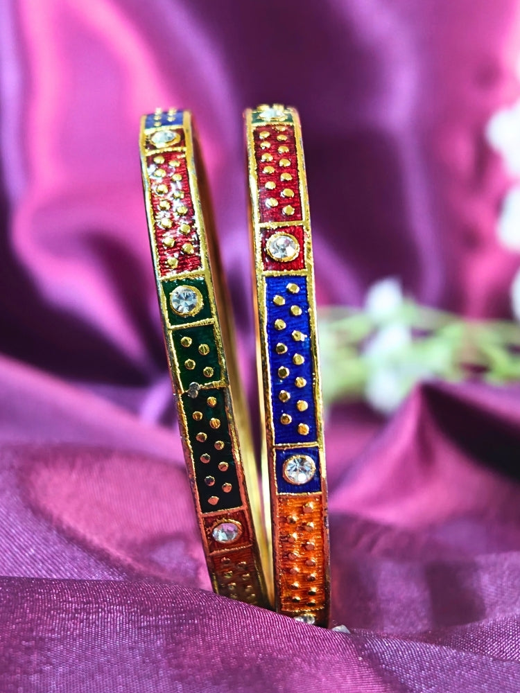 Close-up of an ornate traditional (Gold Polish) Multi-Color Bangles Set. It’s comfortable and lightweight enough for everyday wear, and it also looks absolutely beautiful and elegant. The design is stylish, the finish is impressive, and it feels really pleasant to wear all day.