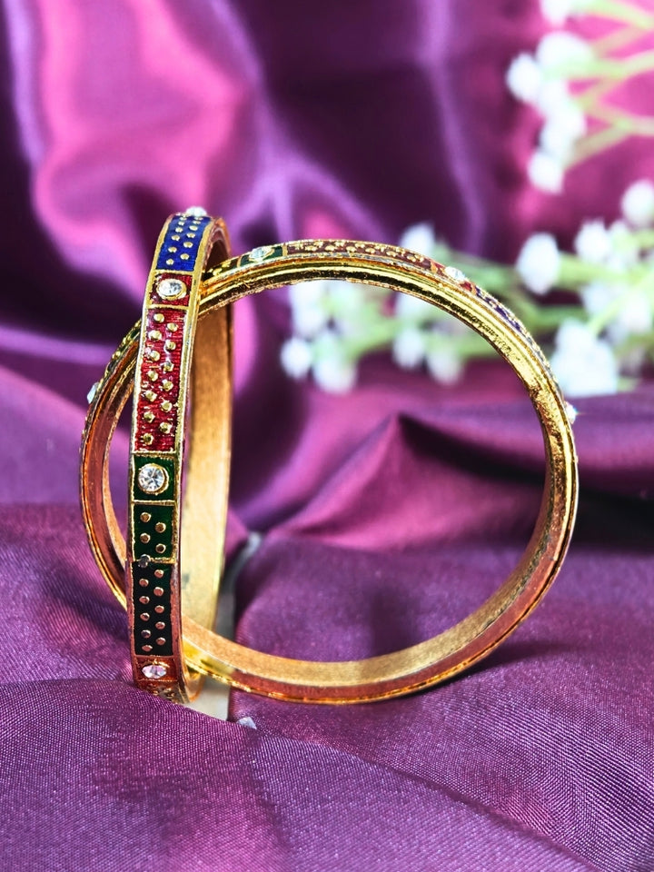 Close-up of an ornate traditional (Gold Polish) Multi-Color Bangles Set. It’s comfortable and lightweight enough for everyday wear, and it also looks absolutely beautiful and elegant. The design is stylish, the finish is impressive, and it feels really pleasant to wear all day.