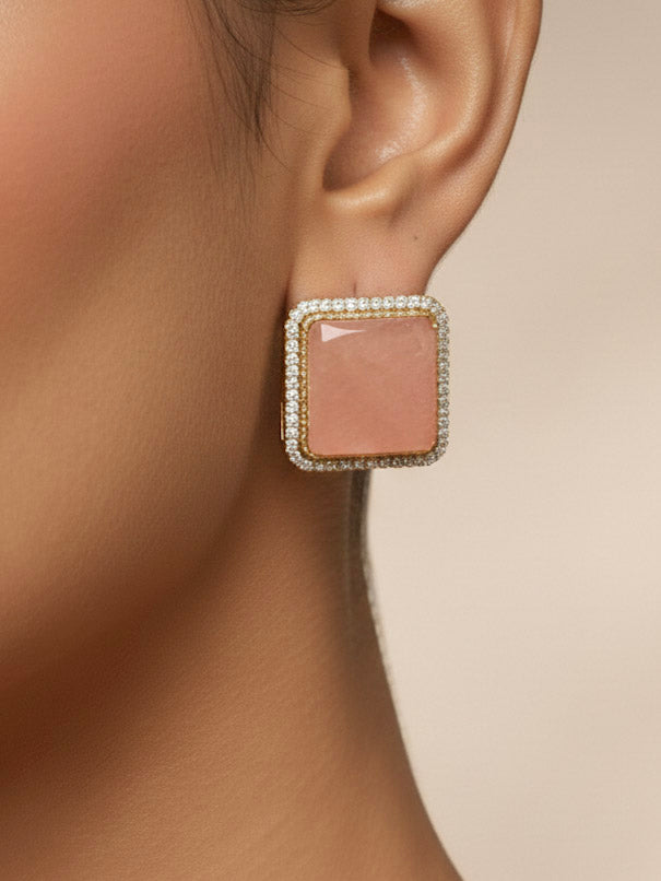 "Elegant woman wearing a luxurious artificial diamond and peach colored stone  necklace with matching earrings, perfect for high-profile wedding receptions and formal galas. This high-end artificial diamond jewelry set combines style, elegance, and affordability for special occasions."
