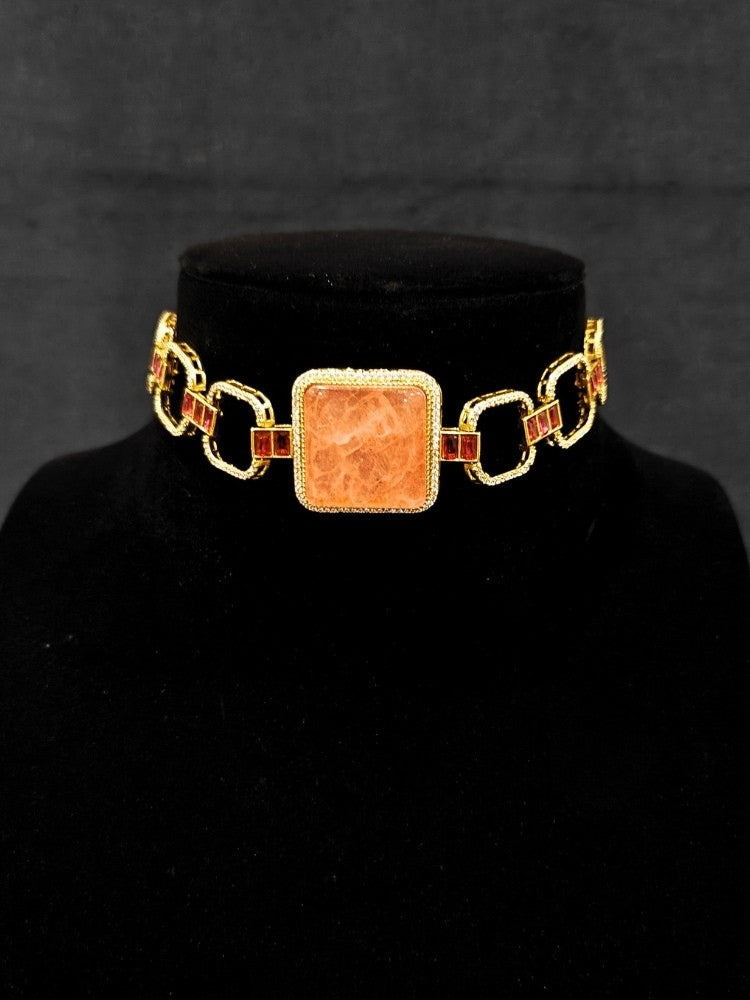 An elegant artificial diamond and peach colored stone choker necklace and matching earrings. This premium artificial diamond jewelry set is perfect for special occasions, from Indian weddings to engagement parties, offering sophisticated glamour without the high price tag.