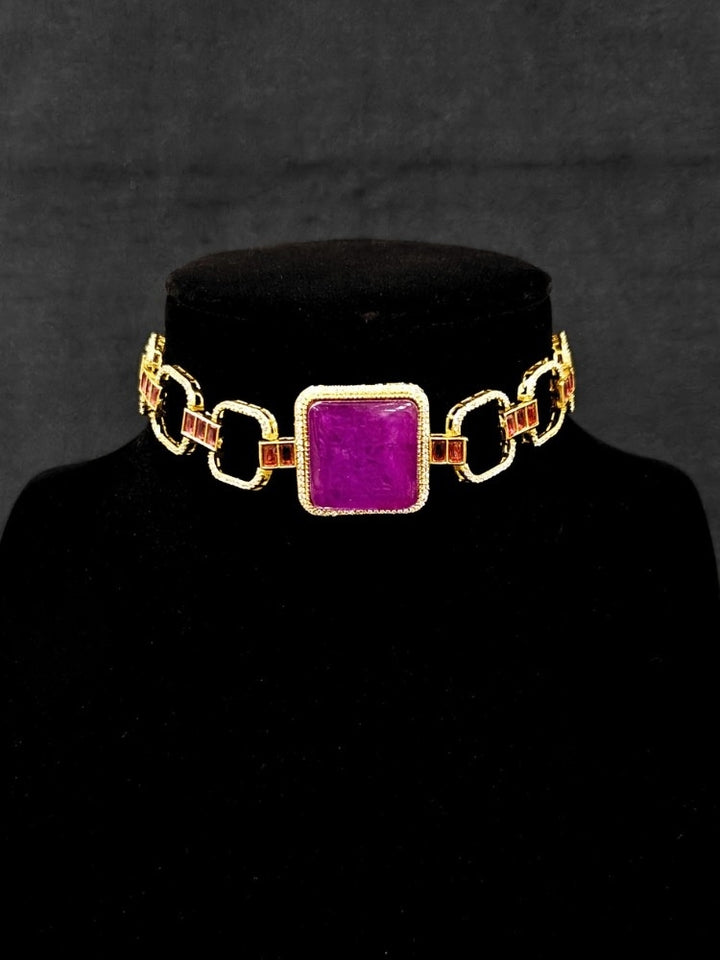 An elegant artificial diamond and purple colored stone choker necklace and matching earrings. This premium artificial diamond jewelry set is perfect for special occasions, from Indian weddings to engagement parties, offering sophisticated glamour without the high price tag.