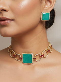 "A beautiful woman wearing an elegant artificial diamond and sea green colored stone choker necklace and matching earrings. This premium artificial diamond jewelry set is perfect for special occasions, from Indian weddings to engagement parties, offering sophisticated glamour without the high price tag."
