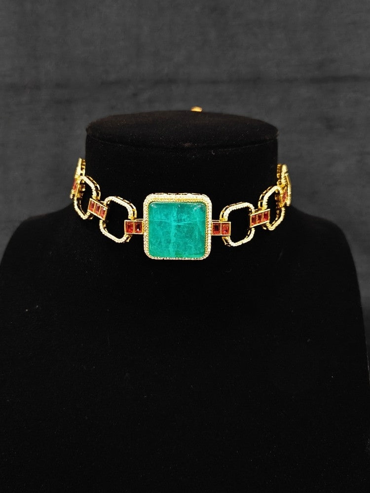 An elegant artificial diamond and sea green colored stone choker necklace and matching earrings. This premium artificial diamond jewelry set is perfect for special occasions, from Indian weddings to engagement parties, offering sophisticated glamour without the high price tag.
