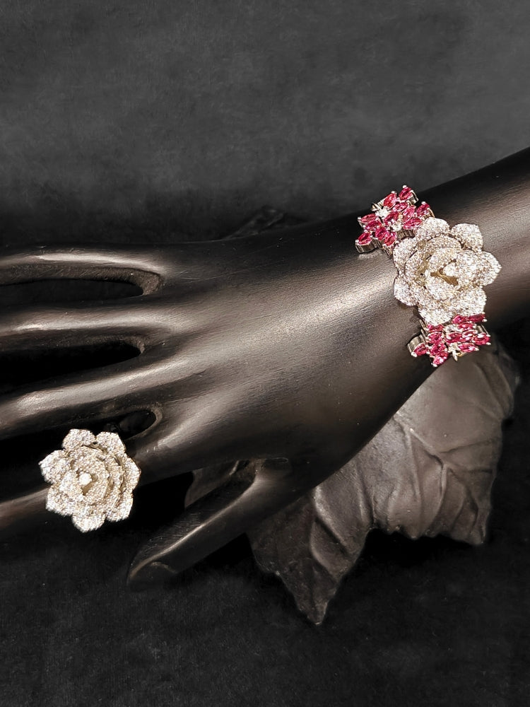 Close-up of an ornate Indo-western Pink Silver Collar American Diamond jewellery set, earrings, maangtikka, Ring and Bracelet with Pink Colored Stones and American Diamond. A graceful trending American diamond necklace for a 2026 wedding celebration.