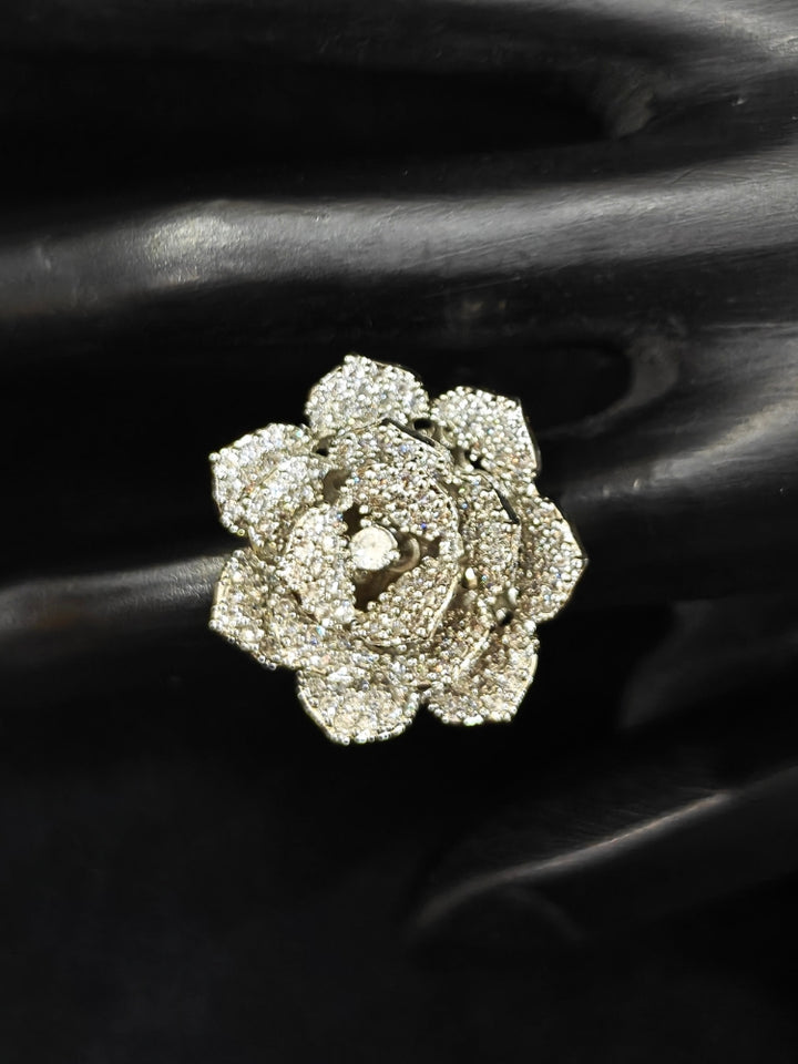 Close-up of an ornate Indo-western Pink Silver Collar American Diamond jewellery set, earrings, maangtikka, Ring and Bracelet with Pink Colored Stones and American Diamond. A graceful trending American diamond necklace for a 2026 wedding celebration.