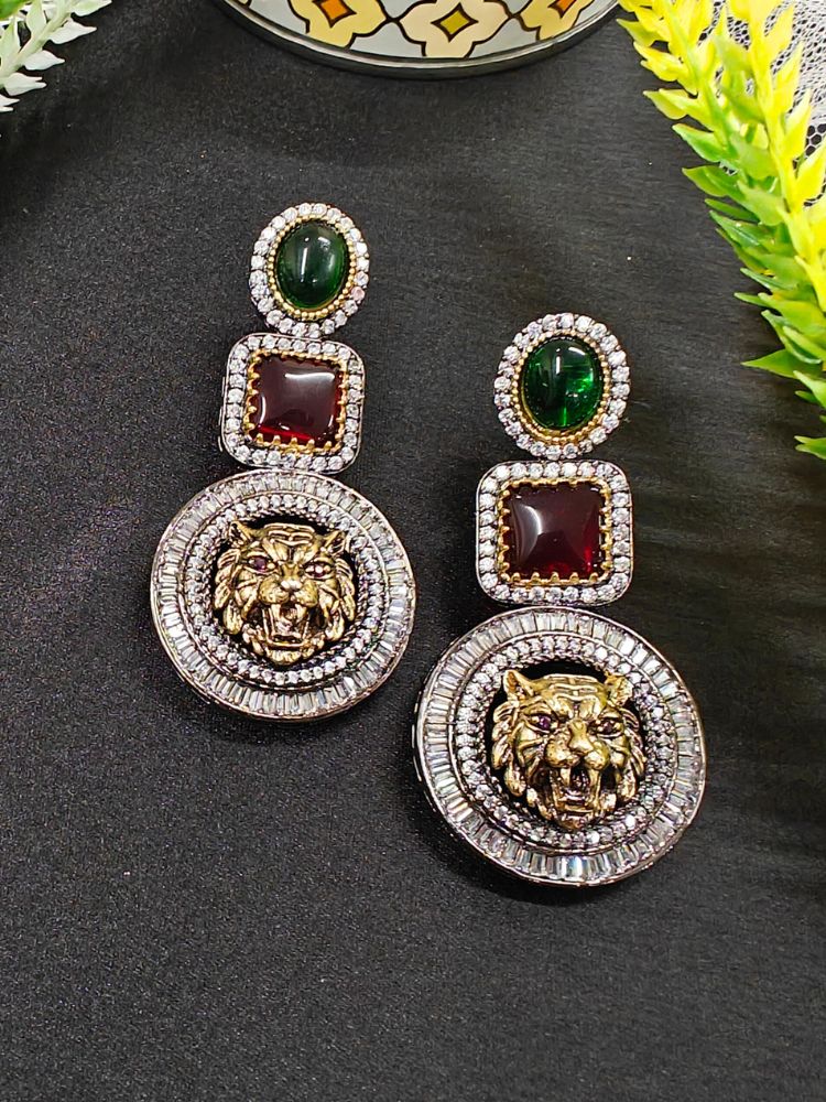 Sabyasachi Inspired Earrings 2: ornate brass earrings with round Red and  
 Square green stones, shimmering American Diamonds, and a large circular pendant featuring a detailed roaring tiger head. Sabyasachi Earrings. American Diamond Earrings. Long Earrings. Party Earrings. 