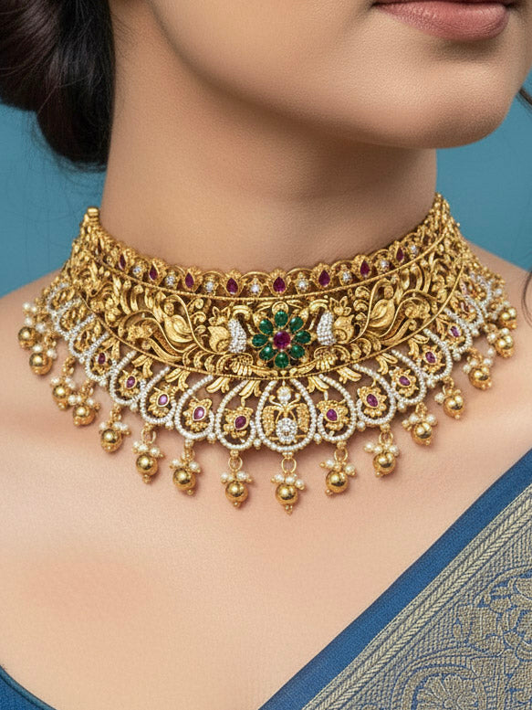 Close-up of a woman wearing an ornate traditional Heritage gold Choker jewellery set and earrings with Pota Stone and American Diamond. Wedding guest look featuring a traditional heritage artificial necklace. Close-up of antique-style detailing in heritage artificial jewelry.