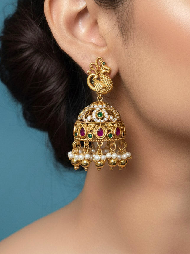 Close-up of a woman wearing an ornate traditional Heritage gold Choker jewellery set and earrings with Pota Stone and American Diamond. Wedding guest look featuring a traditional heritage artificial necklace. Close-up of antique-style detailing in heritage artificial jewelry.