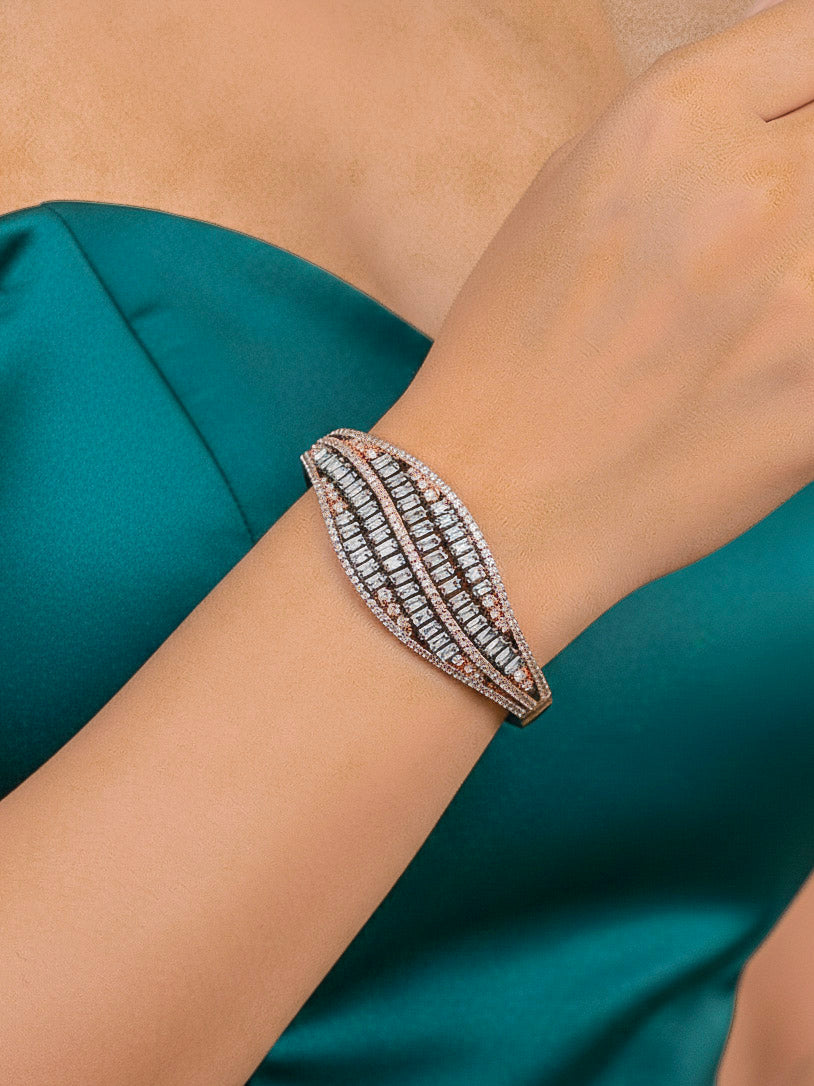 Close-up of a woman wearing an ornate Western (Black Polish) Diamond Bracelet with American Diamond. A woman wearing a luxury American diamond Bracelet styled beautifully for a wedding guest look in India. Model wearing a lightweight American diamond Bracelet perfect for long wedding functions.