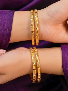 Close-up of an a women wearing ornate traditional (Gold Polish) Bangles Set. It’s comfortable and lightweight enough for everyday wear, and it also looks absolutely beautiful and elegant. The design is stylish, the finish is impressive, and it feels really pleasant to wear all day.