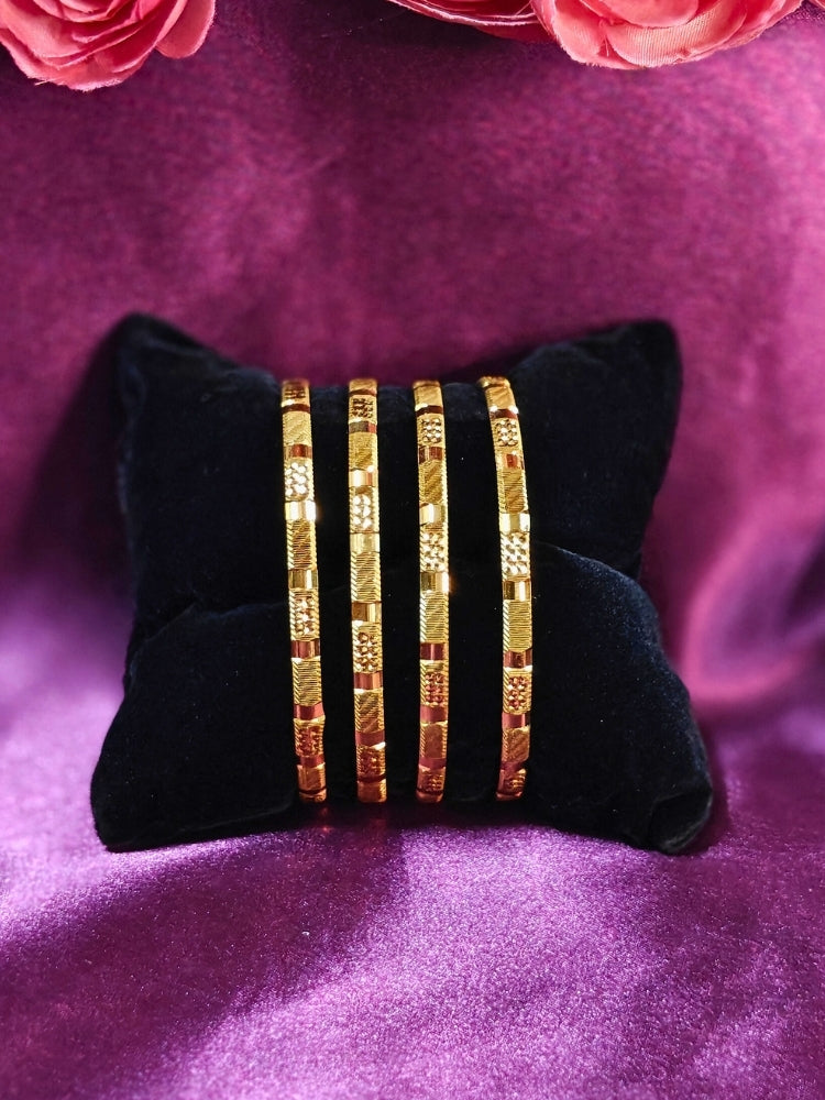 Close-up of an ornate traditional (Gold Polish) Bangles Set. It’s comfortable and lightweight enough for everyday wear, and it also looks absolutely beautiful and elegant. The design is stylish, the finish is impressive, and it feels really pleasant to wear all day.