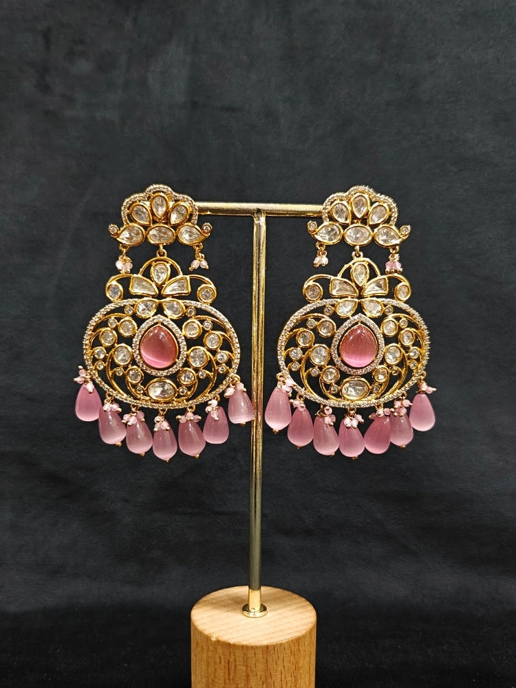 Close-up of an ornate traditional (Gold Polish) Mint Pink Long jewellery set and earrings with Polki, American Diamond, Pearls, Crystal Beads and Tumble Beads. Wedding guest wearing a statement Polki artificial necklace for a reception party. Festive celebration look completed with premium imitation Polki jewelry.
