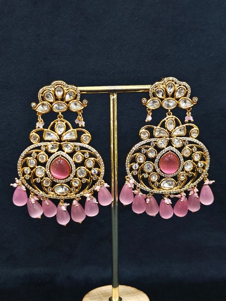 Close-up of an ornate traditional (Gold Polish) Mint Pink Long jewellery set and earrings with Polki, American Diamond, Pearls, Crystal Beads and Tumble Beads. Wedding guest wearing a statement Polki artificial necklace for a reception party. Festive celebration look completed with premium imitation Polki jewelry.