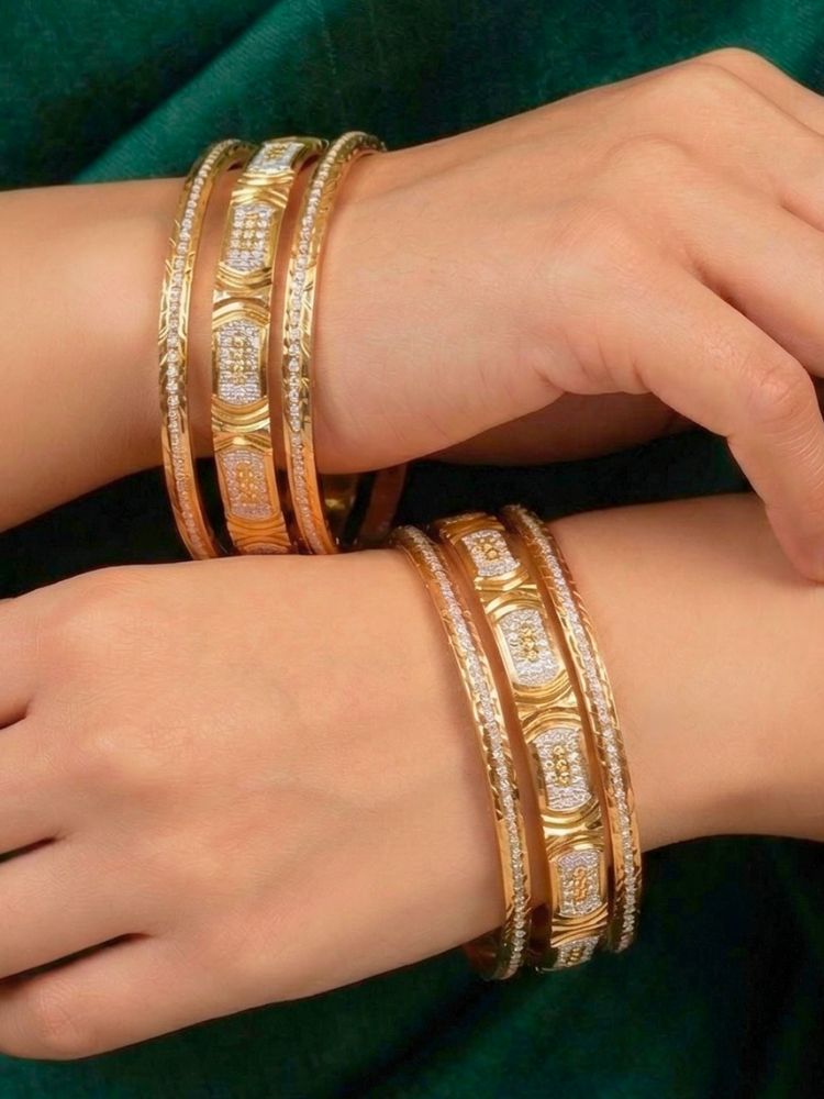 Close-up of an a women wearing ornate traditional (Gold Polish) Gold & Silver Bangles Set. It’s comfortable and lightweight enough for everyday wear, and it also looks absolutely beautiful and elegant. The design is stylish, the finish is impressive, and it feels really pleasant to wear all day.