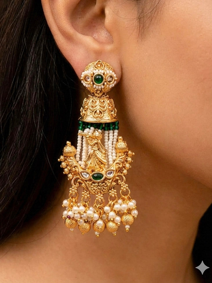 Close-up of a woman wearing an ornate traditional Dark Green Rajwadi gold Long jewellery set and earrings  with Pearls, Hydro Crystal and Bandhai Work. Woman styled in a royal Rajwadi artificial necklace set for a traditional Indian wedding.
Woman wearing a bridal Rajwadi necklace for a reception function.