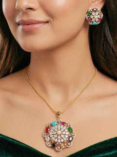 Close-up of a woman wearing an ornate Indo-western Navratan (gold polish) Diamond Pendant set and earrings with American Diamond and Colored Stones. Festive Diwali, Navratri outfit styled with an American diamond artificial Pendant. Indo-western outfit styled with a statement American diamond Pendant set.