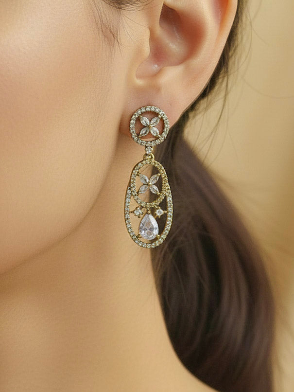 "A stunning woman wearing a glamorous artificial diamond necklace paired with chic earrings and maangtikka, perfect for bridal wear. This high-quality artificial diamond jewelry set is the ideal choice for modern brides looking for a budget-friendly option with timeless sparkle."
