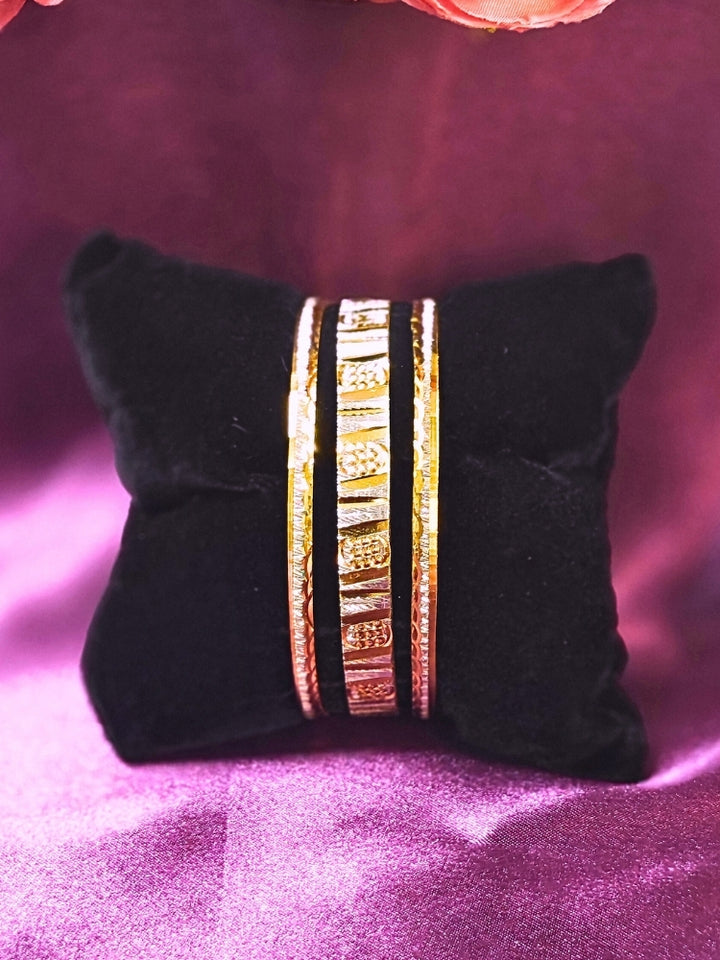 Close-up of an ornate traditional (Gold Polish) Bangles Set. It’s comfortable and lightweight enough for everyday wear, and it also looks absolutely beautiful and elegant. The design is stylish, the finish is impressive, and it feels really pleasant to wear all day.