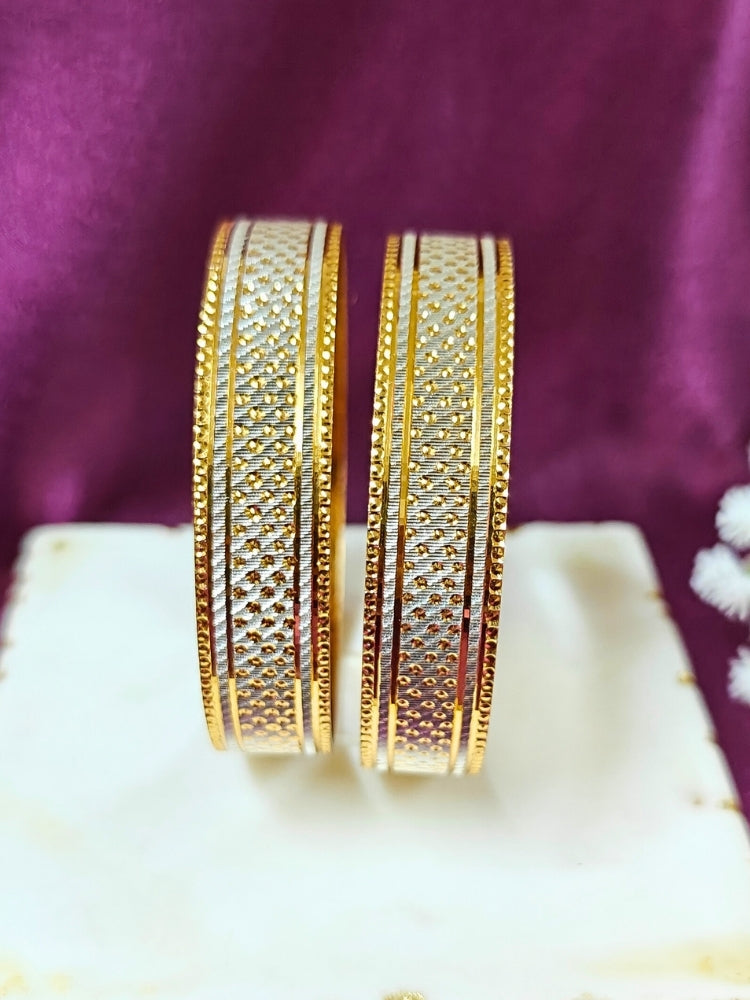 Close-up of an ornate traditional (Gold Polish) White Bangles Set. It’s comfortable and lightweight enough for everyday wear, and it also looks absolutely beautiful and elegant. The design is stylish, the finish is impressive, and it feels really pleasant to wear all day.