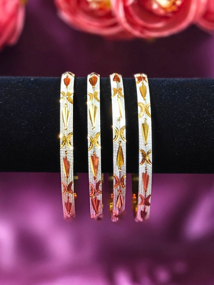 Close-up of an ornate traditional (Gold Polish) Gold & Silver Bangles Set. It’s comfortable and lightweight enough for everyday wear, and it also looks absolutely beautiful and elegant. The design is stylish, the finish is impressive, and it feels really pleasant to wear all day.