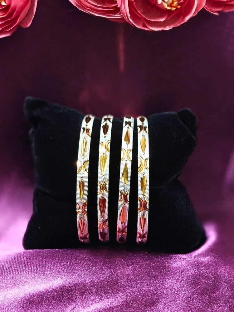 Close-up of an ornate traditional (Gold Polish) Gold & Silver Bangles Set. It’s comfortable and lightweight enough for everyday wear, and it also looks absolutely beautiful and elegant. The design is stylish, the finish is impressive, and it feels really pleasant to wear all day.