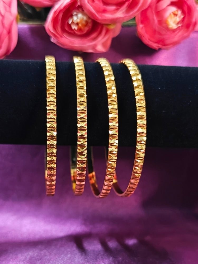Close-up of an ornate traditional (Gold Polish) Bangles Set. It’s comfortable and lightweight enough for everyday wear, and it also looks absolutely beautiful and elegant. The design is stylish, the finish is impressive, and it feels really pleasant to wear all day.