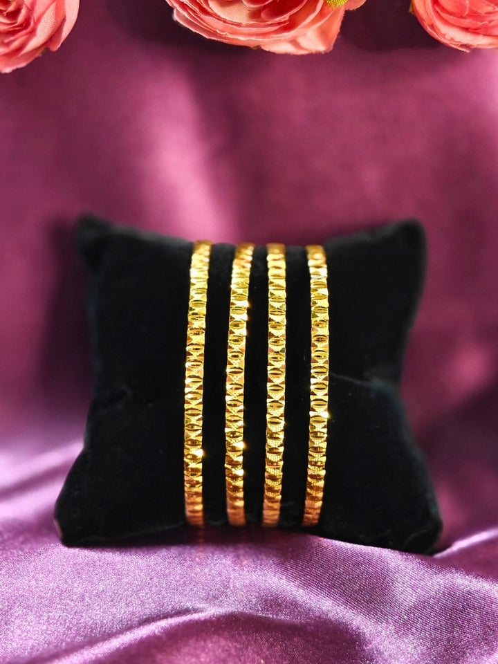 Close-up of an ornate traditional (Gold Polish) Bangles Set. It’s comfortable and lightweight enough for everyday wear, and it also looks absolutely beautiful and elegant. The design is stylish, the finish is impressive, and it feels really pleasant to wear all day.