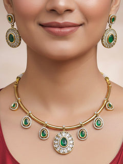 Close-up of a woman wearing an ornate Indo-western Dark Green (Dull gold) Hasli Diamond jewellery set and earrings with American Diamond and Colored Stones. Wedding guest wearing a sparkling American diamond necklace with a saree.
Close-up shot of a high-quality American diamond artificial necklace worn for festive celebrations.