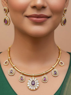 Close-up of a woman wearing an ornate Indo-western Purple (Dull gold) Hasli Diamond jewellery set and earrings with American Diamond and Colored Stones. Wedding guest wearing a sparkling American diamond necklace with a saree.
Close-up shot of a high-quality American diamond artificial necklace worn for festive celebrations.