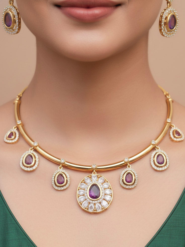 Close-up of a woman wearing an ornate Indo-western Purple (Dull gold) Hasli Diamond jewellery set and earrings with American Diamond and Colored Stones. Wedding guest wearing a sparkling American diamond necklace with a saree.
Close-up shot of a high-quality American diamond artificial necklace worn for festive celebrations.