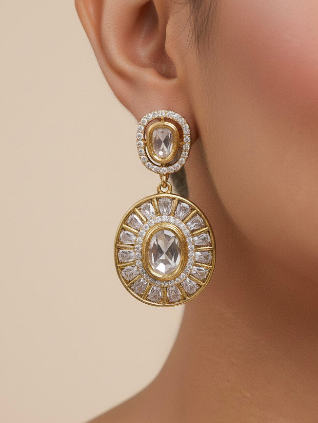 Close-up of a woman wearing an ornate Indo-western White (Dull gold) Hasli Diamond jewellery set and earrings with American Diamond. Wedding guest wearing a sparkling American diamond necklace with a saree.
Close-up shot of a high-quality American diamond artificial necklace worn for festive celebrations.