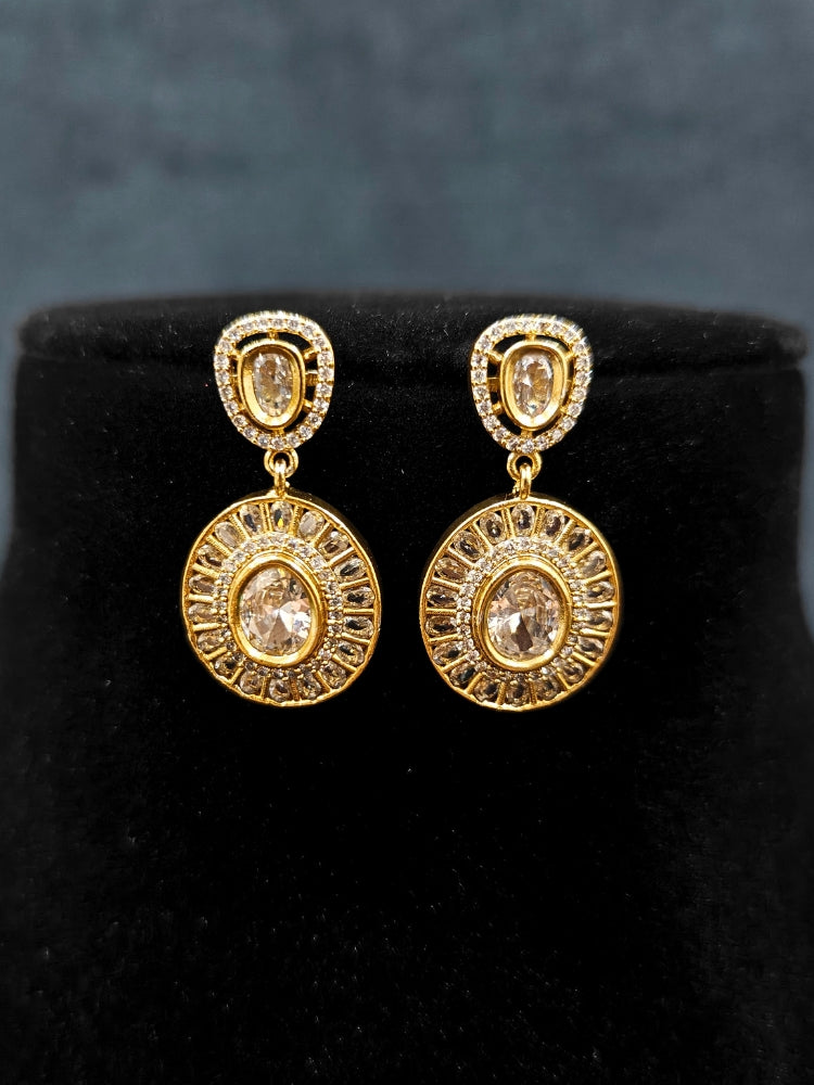 Close-up of an ornate Indo-western White (Dull gold) Hasli Diamond jewellery set and earrings with American Diamond. Wedding guest wearing a sparkling American diamond necklace with a saree.
Close-up shot of a high-quality American diamond artificial necklace worn for festive celebrations.
