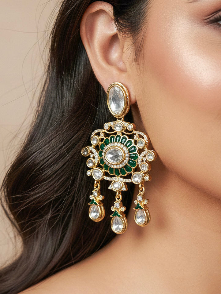 Close-up of a woman wearing an ornate traditional (Bright Gold) Green Collar jewellery set and earrings and maangtikka with Green Colored Stones, Kundan, American Diamond and Pearls. Woman wearing trending artificial Moissanite jewelry for wedding season in India. Bride wearing a high-quality artificial Moissanite jewelry set for wedding rituals.