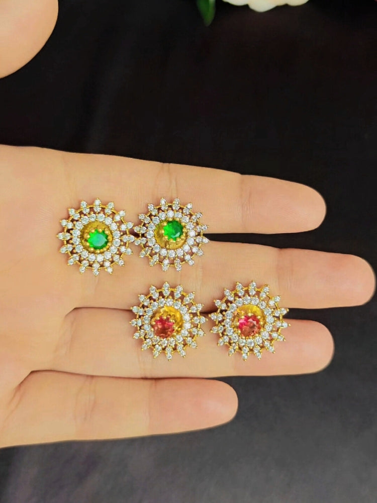 Close-up of an ornate Indo-western Multi-Color Changeable (Mehendi gold Polish) Collar jewellery set and earrings with American Diamond and Colored Stones. Party wear outfit completed with a lightweight American diamond necklace. Close-up shot of a high-quality American diamond artificial necklace worn for festive celebrations.