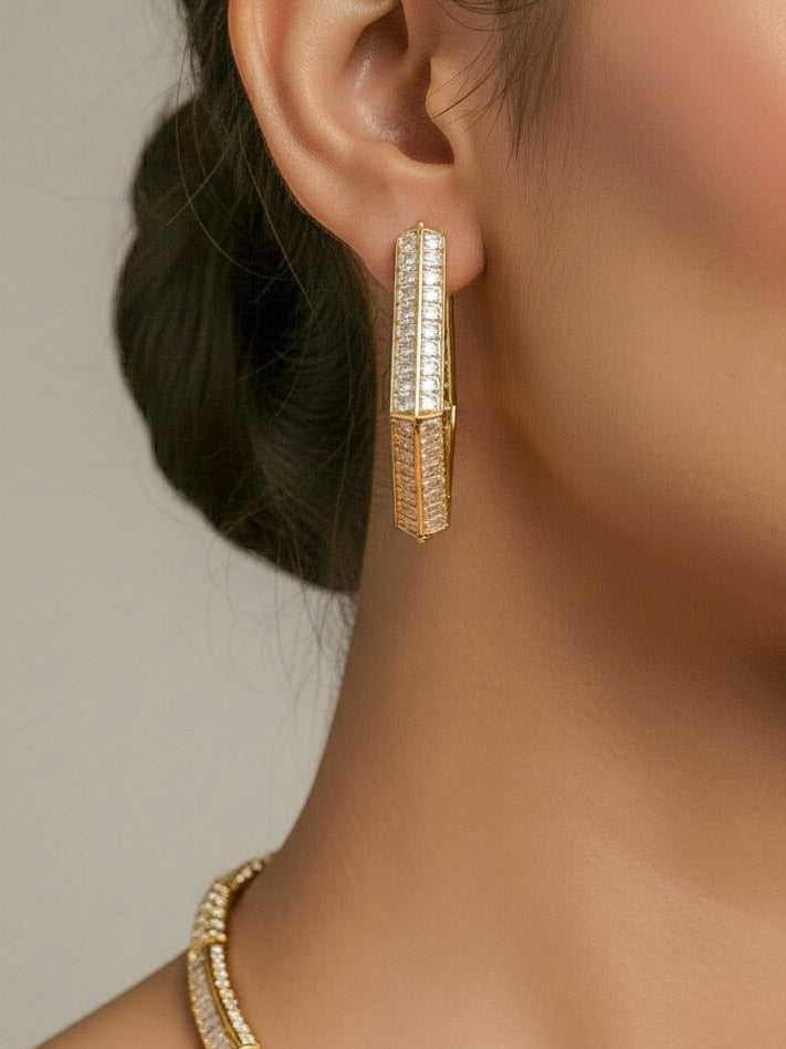 "A woman showcasing a beautiful artificial diamond necklace with red colored stone and earrings set, ideal for festivals, family gatherings, and special celebrations in India. This elegant diamond jewelry provides the perfect blend of sparkle and tradition, with a modern twist."