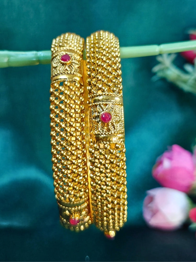 Close-up of an ornate traditional (Gold Polish) Bangles Set. It’s comfortable and lightweight enough for everyday wear, and it also looks absolutely beautiful and elegant. The design is stylish, the finish is impressive, and it feels really pleasant to wear all day.