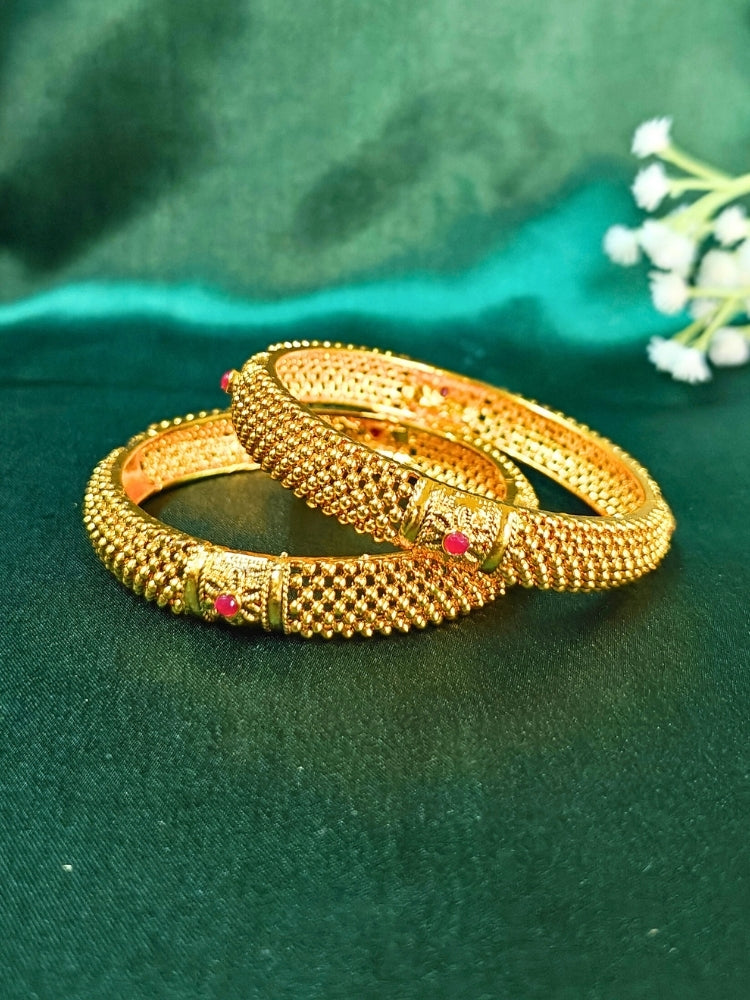 Close-up of an ornate traditional (Gold Polish) Bangles Set. It’s comfortable and lightweight enough for everyday wear, and it also looks absolutely beautiful and elegant. The design is stylish, the finish is impressive, and it feels really pleasant to wear all day. 