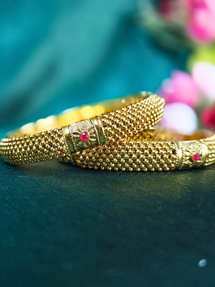 Close-up of an ornate traditional (Gold Polish) Bangles Set. It’s comfortable and lightweight enough for everyday wear, and it also looks absolutely beautiful and elegant. The design is stylish, the finish is impressive, and it feels really pleasant to wear all day.