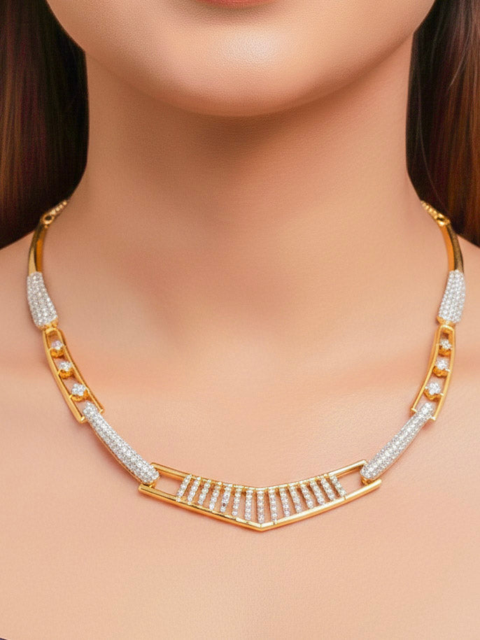 Close-up of a woman wearing an ornate Indo-western gold & White Collar jewellery set and earrings with American Diamond. A woman wearing a luxury American diamond necklace set styled beautifully for a wedding guest look in India. Model wearing a lightweight American diamond necklace perfect for long wedding functions.
