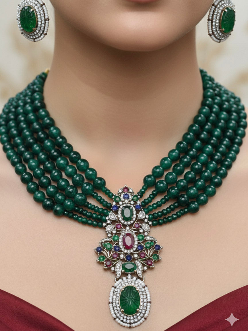 Close-up of a woman wearing an ornate traditional Green Collar jewellery set and earrings with American Diamond, Colored Stones and Green Beads. Mehendi ceremony styling featuring a premium American Diamond artificial jewelry piece.
Close-up of a featuring an anti-tarnish American diamond artificial necklace.