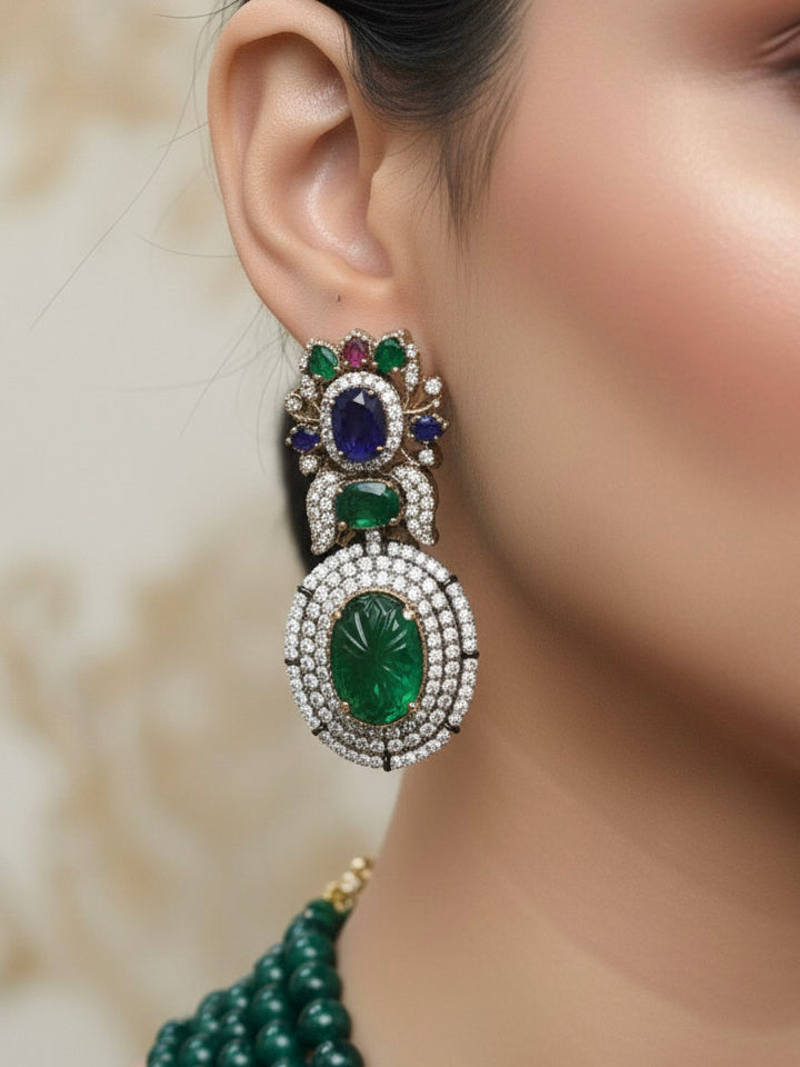 Close-up of a woman wearing an ornate traditional Green Collar jewellery set and earrings with American Diamond, Colored Stones and Green Beads. Mehendi ceremony styling featuring a premium American Diamond artificial jewelry piece.
Close-up of a featuring an anti-tarnish American diamond artificial necklace.