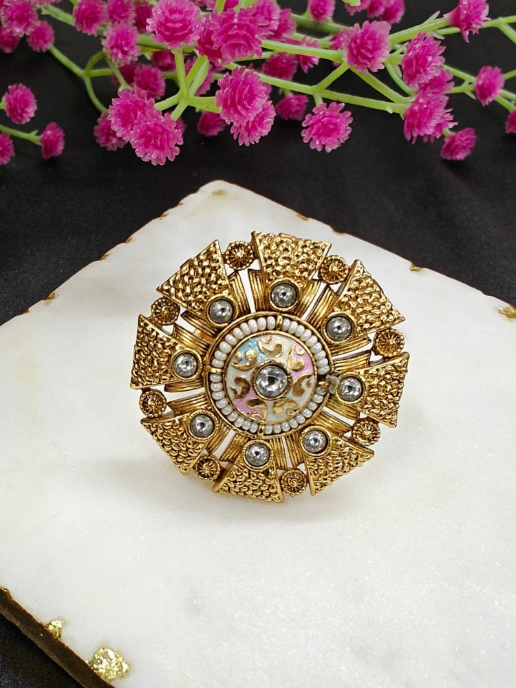 Close-up of an ornate traditional White Meenakari gold Ring with Kundan, Meenakari and Pearls. Wedding guest wearing a statement Meenakari artificial cocktail ring. Perfect Meenakari Ring for weddings and festivals.