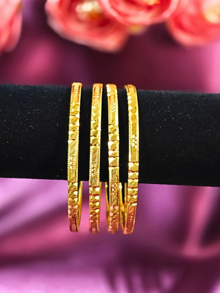 Close-up of an ornate traditional (Gold Polish) Bangles Set. It’s comfortable and lightweight enough for everyday wear, and it also looks absolutely beautiful and elegant. The design is stylish, the finish is impressive, and it feels really pleasant to wear all day.