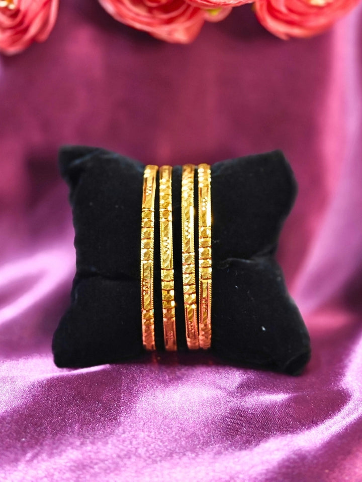 Close-up of an ornate traditional (Gold Polish) Bangles Set. It’s comfortable and lightweight enough for everyday wear, and it also looks absolutely beautiful and elegant. The design is stylish, the finish is impressive, and it feels really pleasant to wear all day.