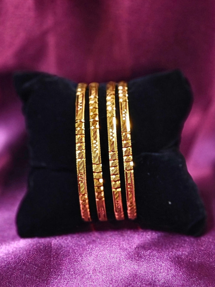Close-up of an ornate traditional (Gold Polish) Bangles Set. It’s comfortable and lightweight enough for everyday wear, and it also looks absolutely beautiful and elegant. The design is stylish, the finish is impressive, and it feels really pleasant to wear all day.