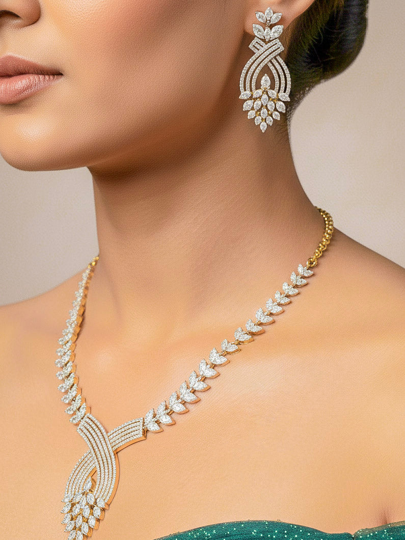 Close-up of a women wearing an ornate Western American Diamond Gold Collar jewellery set and earrings with American Diamond. Close-up of a featuring an anti-tarnish American diamond artificial necklace. A luxury American diamond necklace set styled beautifully for a wedding guest look in India.