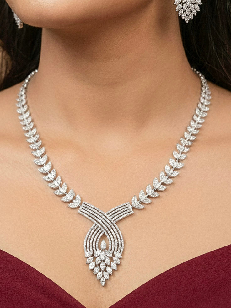 "A bride-to-be wearing an exquisite artificial diamond necklace and matching earrings, designed for the perfect engagement look. This stunning artificial diamond jewelry set offers luxury and sophistication while being an affordable alternative to natural diamonds."