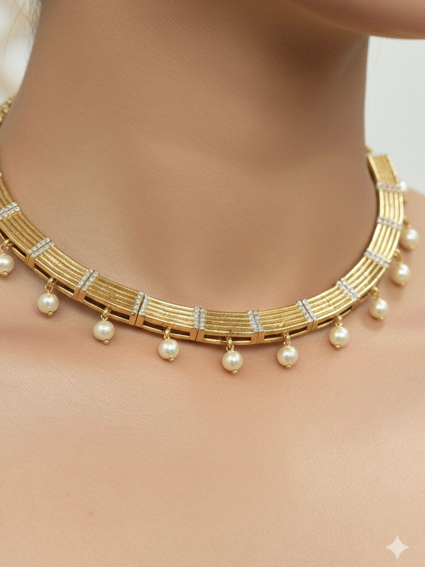 Close-up of a woman wearing an ornate traditional (Gold Polish) Collar jewellery set and earrings with American Diamond and Pearl. Festive saree styling completed with an elegant artificial Pearl jewelry piece. Festive party wear look featuring a Collar Pearl artificial jewelry piece.