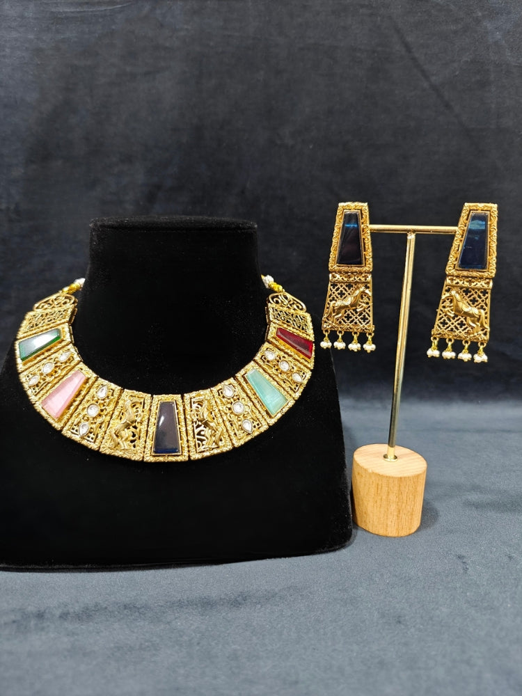 A glamorous artificial diamond and multi colored stone amrapali necklace paired with chic earrings, perfect for bridal wear. This high-quality artificial diamond jewelry set is the ideal choice for modern brides looking for a budget-friendly option with timeless sparkle.